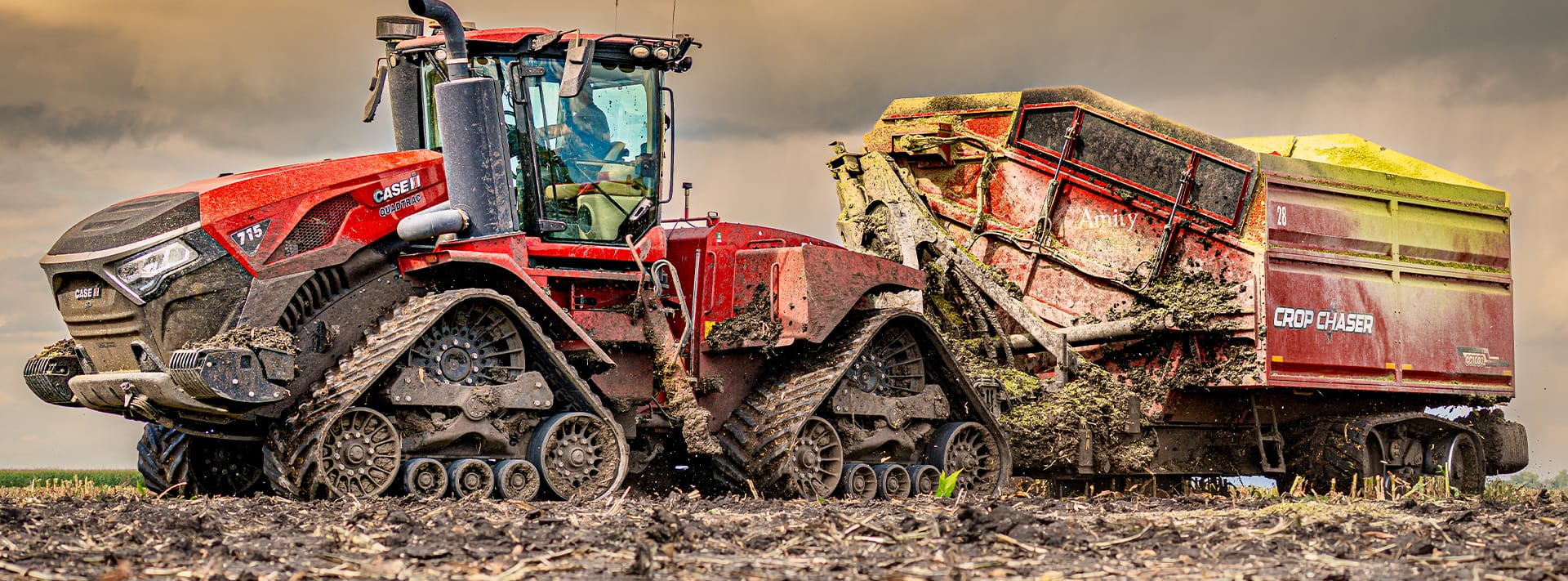 Muddy CC1000 Crop Chaser covered in mud but still harvesting